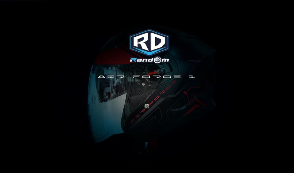 Motorcycle helmet with 'RD Random' logo on a dark background